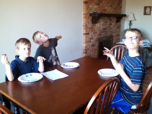 The kids ate them before I could get a picture of them with the cookies.  (My fourth kid was on his way home from school.  He's deaf so he goes to a different school from the others.  Don't worry, he got some cookies at dinner.)