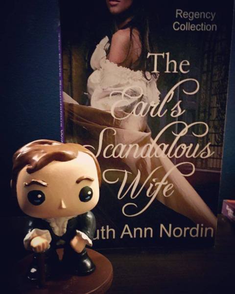 Perry in front of his book